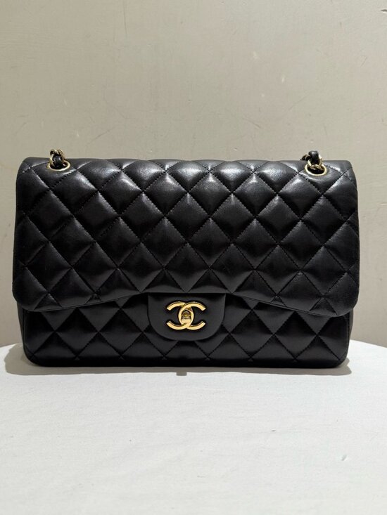 CHANEL Handbags - Chanel Classic Flap Jumbo Black Quilted Lambskin Shoulder Bag